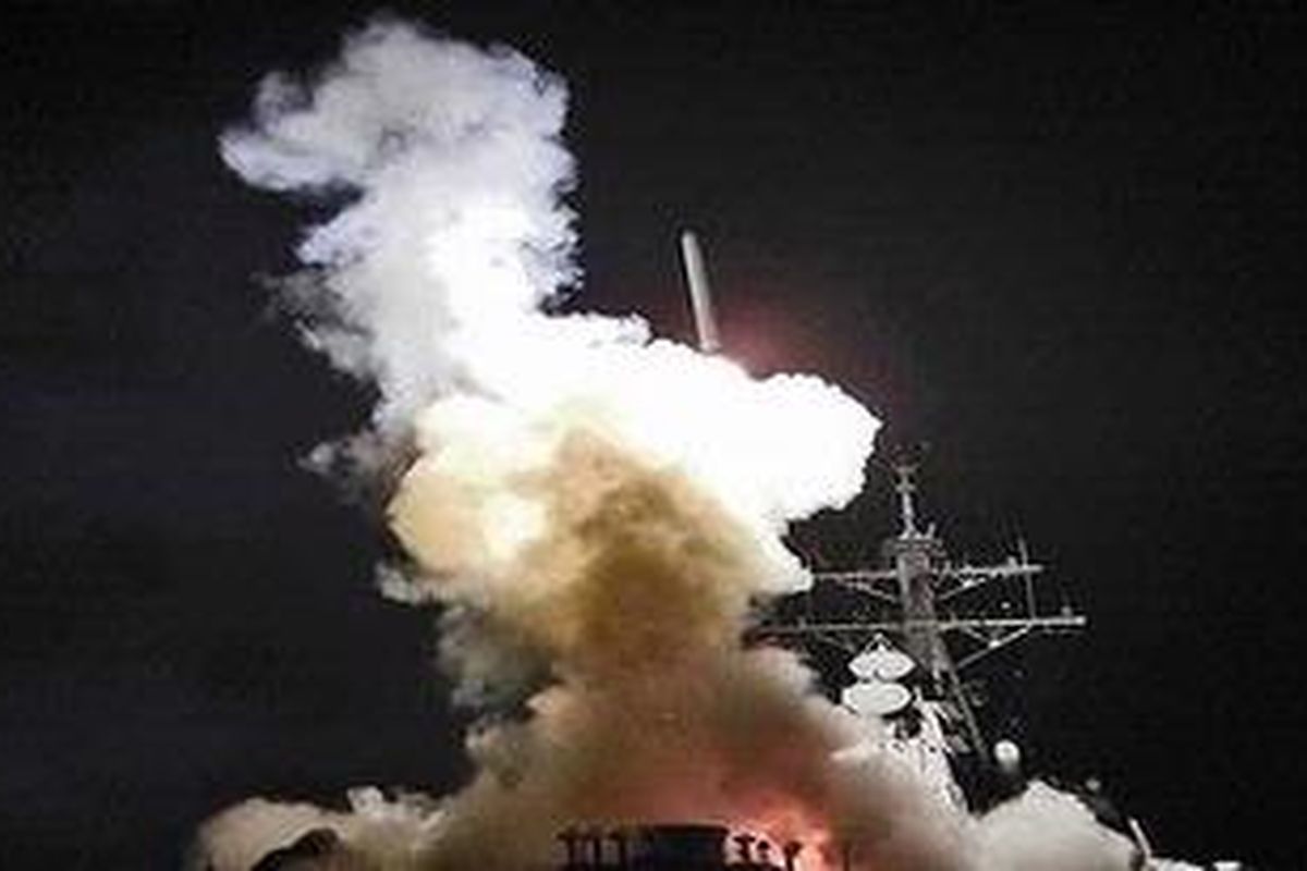 Arleigh Burke-class guided-missile destroyer USS Barry (DDG 52) launches a Tomahawk missile in support of Operation Odyssey Dawn on Saturday. 