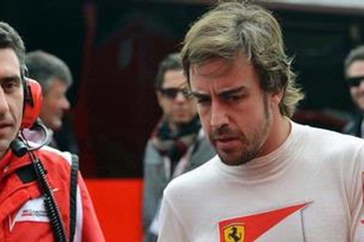 Pebalap Ferrari, Fernando Alonso (kanan).