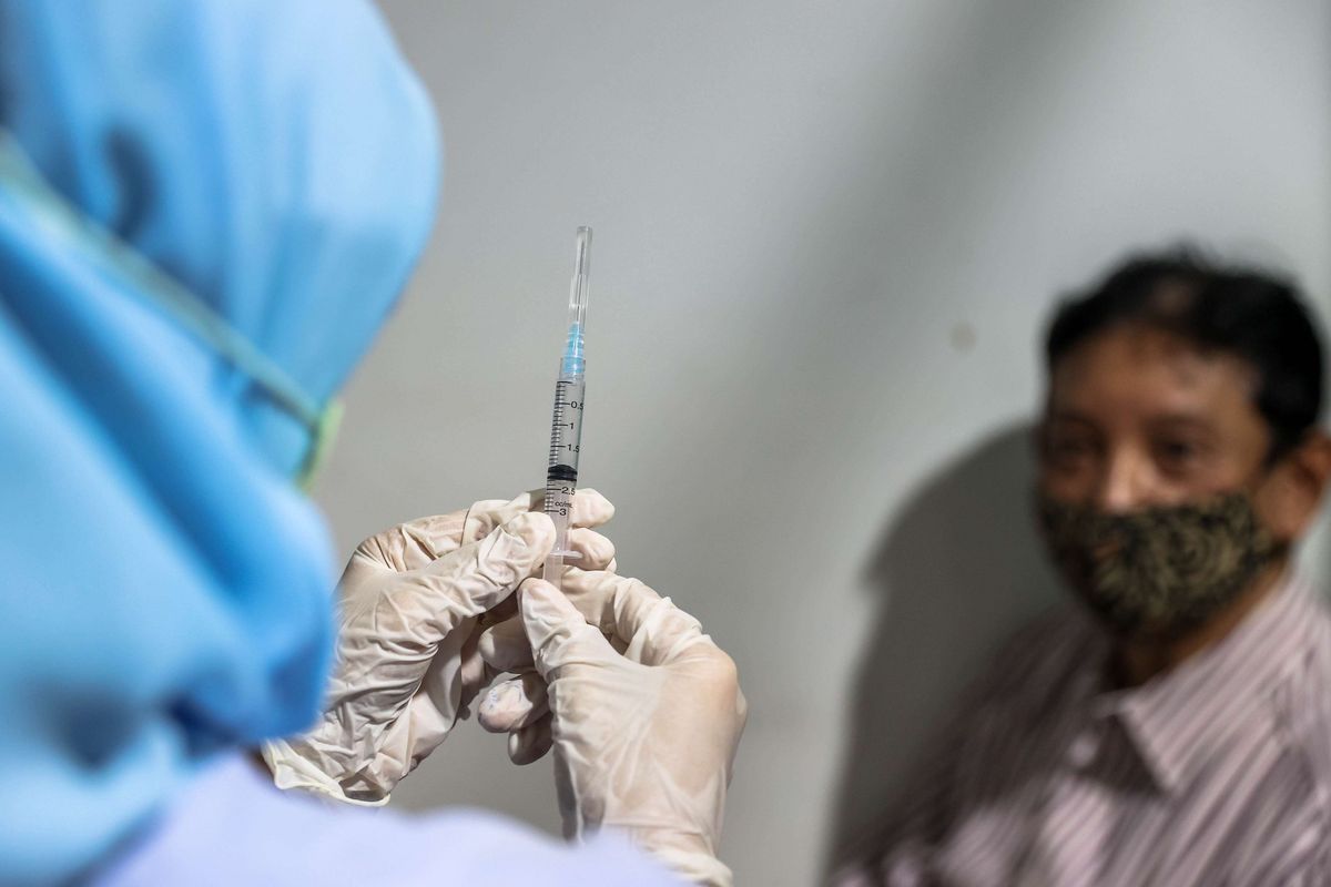 Ilustrasi vaksin booster Covid-19. Inilah lokasi layanan vaksin booster di Kabupaten Bogor jelang Lebaran 2022.
