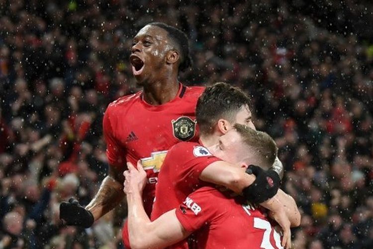 Scott McTominay, Aaron Wan-Bissaka dalam duel Manchester United vs Manchester City pada pekan ke-29 Liga Inggris 2019-2020.