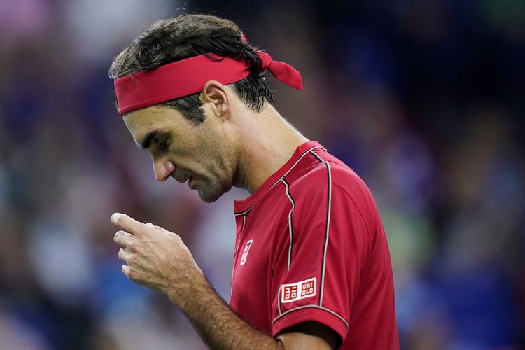 Tennis - Shanghai Masters - Mens Singles - Quarterfinals - Qi Zhong Tennis Center, Shanghai, China - October 11, 2019. Roger Federer of Switzerland reacts during his match against Alexander Zverev of Germany. REUTERS/Aly Song