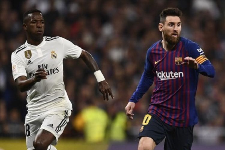 Vinicius Junior membayang-bayangi Lionel Messi pada pertandingan Real Madrid vs Barcelona dalam semifinal Copa del Rey di Stadion Santiago Bernabeu, 27 Februari 2019. 