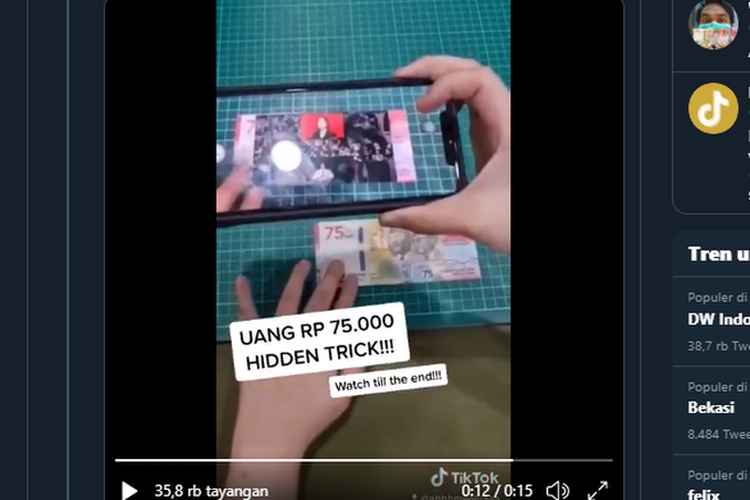 Tangkapan layar video pengoperasian aplikasi Ivive yang memunculkan video pada uang kertas pecahan Rp 75.000.