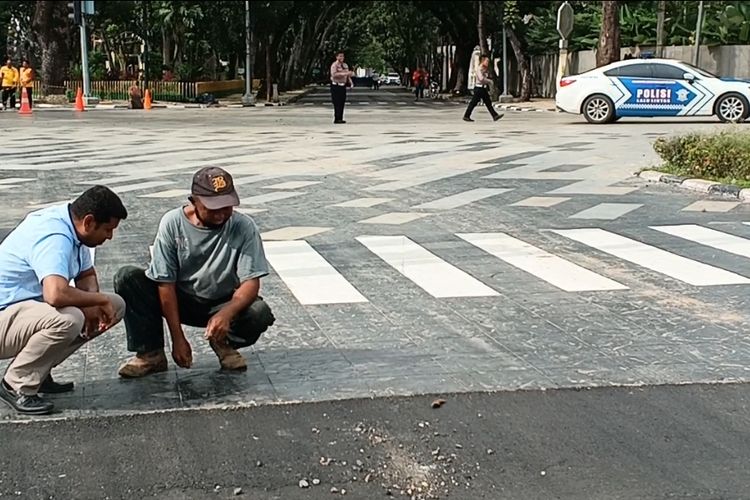 Penampakan Jalan Sudirman di Kota Medan yang disebut mirip keramik, Selasa (21/11/2033)