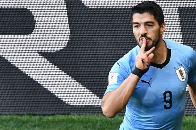 Gaya Luis Suarez ketika merayakan gol Uruguay ke gawang Arab Saudi pada laga Grup B Piala Dunia 2018 di Rostov Arena, 19 Juni 2018. 