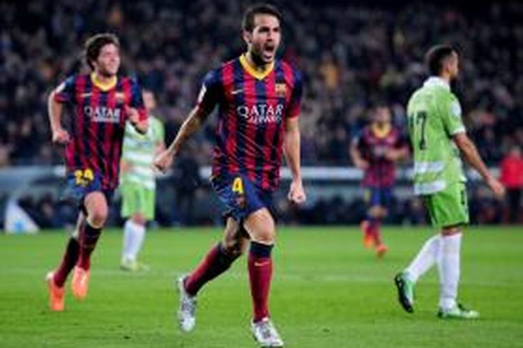 Gelandang Barcelona, Cecs Fabregas saat melakukan selebrasi seusai mencetak gol ke gawang Getafe pada leg pertama 16 besar Copa del Rey di Stadion Camp Nou, Rabu atau Kamis (9/1/2014) dini hari WIB. Barcelona sementara unggul 1-0 hingga akhir babak pertama. 