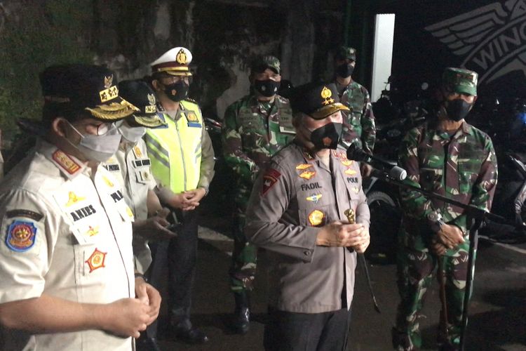 Jakarta Governor Anies Baswedan sees enforcement of health protocols by military and police personnel on Friday (18/6/2021)