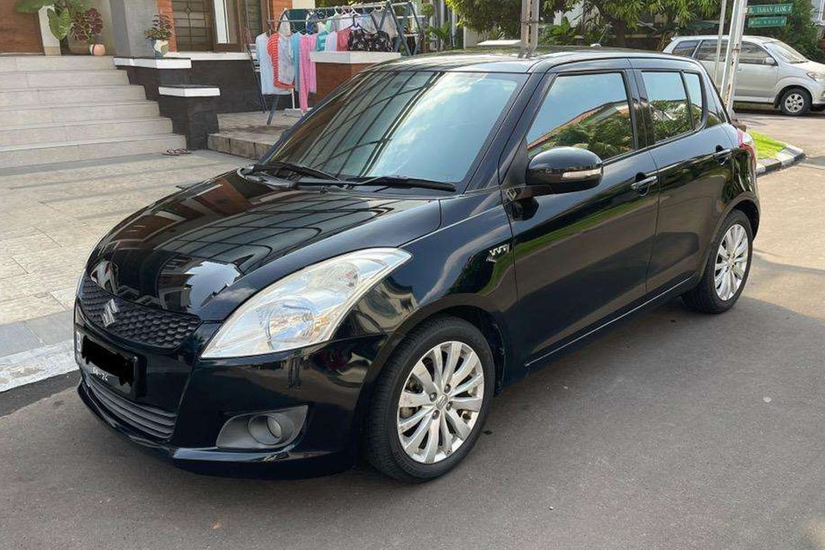 Ilustrasi Suzuki Swift GX bekas lansiran tahun 2014