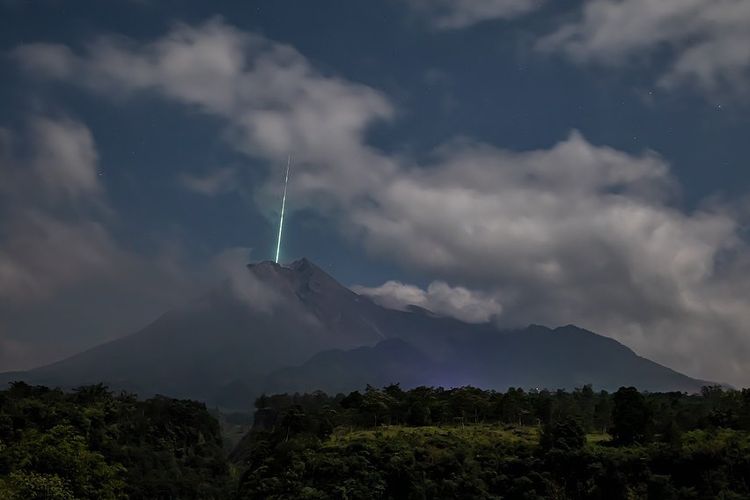 A photo shows a blue flash streaks at the top Mount Merapi on Thursday, May 27.