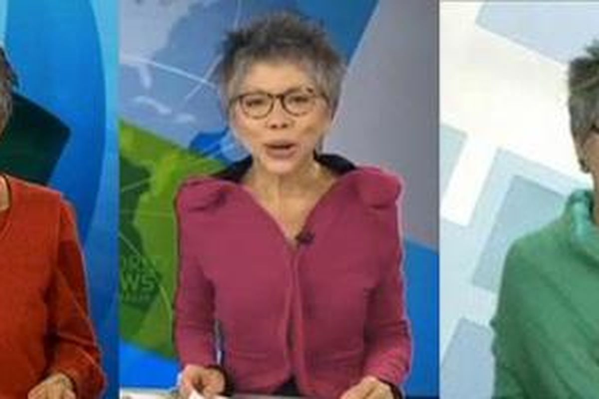 Gaya busana nyentrik Lee Lin Chin saat menyiarkan berita televisi. 