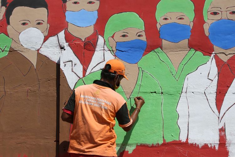 A mural in Bukit Duri, South Jakarta pays tribute to Indonesian medical workers fighting Covid-19, 27 August 2020