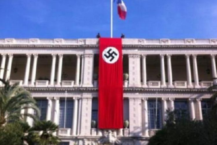 Gedung tempat bendera dibentang menjadi hotel yang digunakan untuk koordinasi Pasukan SS Nazi. 