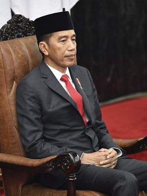 Presiden Joko Widodo menghadiri pelantikan anggota Dewan Perwakilan Rakyat (DPR) periode 2019-2024 di Ruang Rapat Paripurna, Kompleks Parlemen, Senayan, Jakarta, Selasa, (1/10/2019). Sebanyak 575 anggota DPR terpilih dan 136 orang anggota DPD terpilih diambil sumpahnya pada pelantikan tersebut.