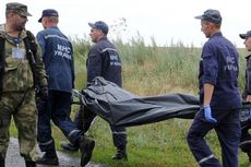 Tim DVI Polri Pantau Pengangkatan Jenazah Penumpang #MH17 di Ukraina