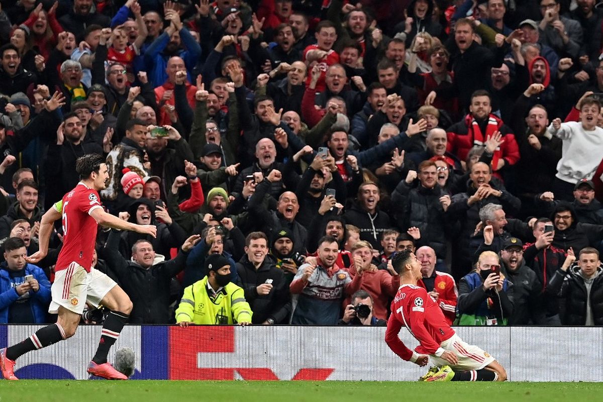 Penyerang Manchester United Cristiano Ronaldo merayakan gol ke gawang Atalanta di laga Grup F Liga Champions, Kamis (21/10/2021) dini hari WIB.