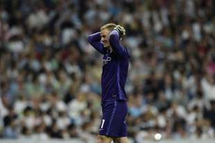Ekspresi kekecewaan penjaga gawang Manchester City, Joe Hart, pada laga semifinal kedua kontra Real Madrid di Stadion Santiago Bernabeu, Rabu (4/5/2016) waktu setempat.