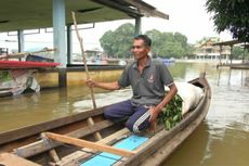 Cerita Warga Evakuasi Kambing yang Nyaris Tenggelam Akibat Banjir di Desa Buluh Cina Kampar