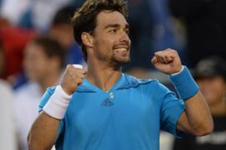 Petenis Italia Fabio Fognini merayakan kemengan atas Leonardo Mayer dari Argentina pada final turnamen di Vina del Mar, Chile, Minggu (9/2/2014). Fognini menang 6-2, 6-4.