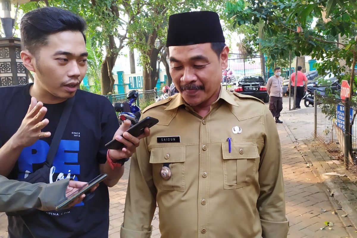 Lurah Benda Baru Saidun usai menjalani pemeriksaan di Polsek Pamulang, Tangerang Selatan, Selasa (28/7/2020)