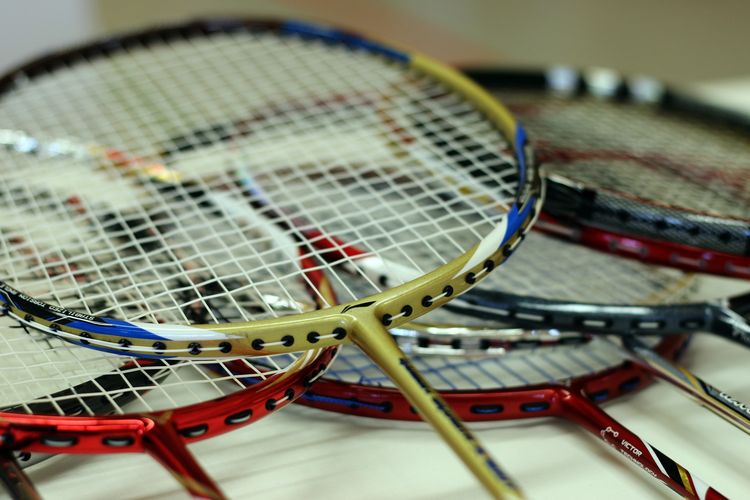 An illustration of badminton racket. 