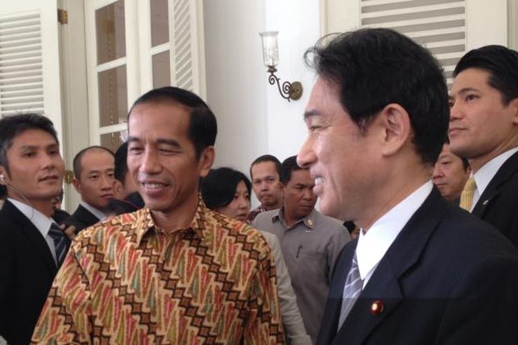 A file photo of Fumio Kishida (right), then Japan's Foreign Minister, and Joko Widodo (left), then Jakarta's Governor during a meeting at the City Hall dated Tuesday, August 12, 2014. Kishida will become Japan's 100th prime minister as he is elected as the new leader of the country's ruling Liberal Democratic Party (LDP) on Wednesday, September 29. Parliament will elect him as the nation's prime minister on October 4. 