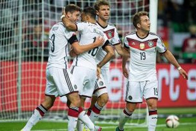 Jerman menang 3-1 atas Polandia berkat gol-gol dari Thomas Mueller dan Mario Goetze, Jumat (4/9/2015). 