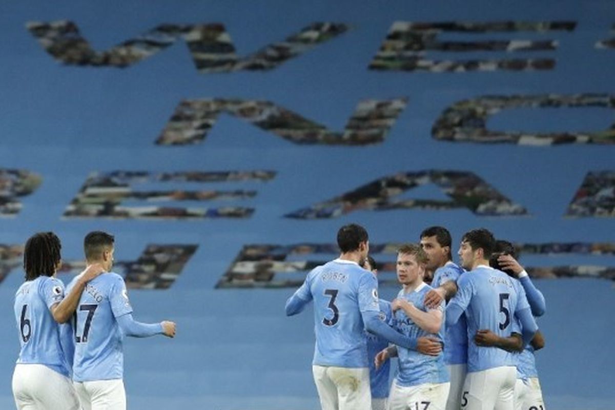 Skuad Manchester City merayakan gol Ilkay Gundogan dalam pertandingan Man City vs Newcastle pada pekan ke-15 Liga Inggris di Stadion Etihad, Minggu (27/12/2020) dini hari WIB. 