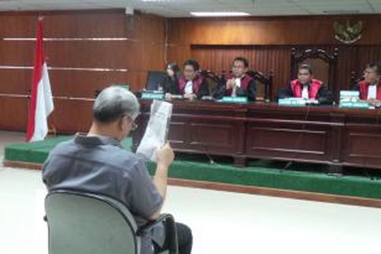 Mantan Ketua Mahkamah Konstitusi Akil Mochtar menghadapi sidang tuntutan di Pengadilan Tindak Pidana Korupsi, Jakarta, Senin (16/6/2014).