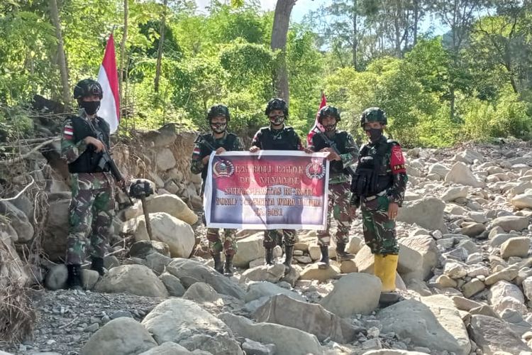 Members of the Indonesia-Timor Leste Border Security (Pamtas RI-RDTL) Task Force are on patrol to check the border.