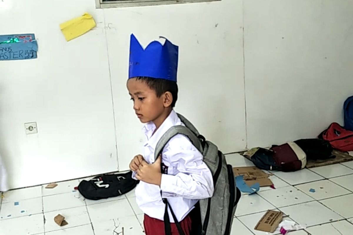 Karim (10), murid sekolah Master di Sekolah Master Indonesia, Jalan Arif Rahman Hakim, Depok, Selasa (30/4/2019).