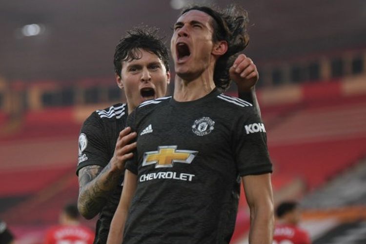 Penyerang Manchester United, Edinson Cavani, saat merayakan gol ke gawang Southampton pada laga lanjutan pekan ke-10 Liga Inggris di Stadion St Marys, Minggu (29/11/2020) malam WIB.