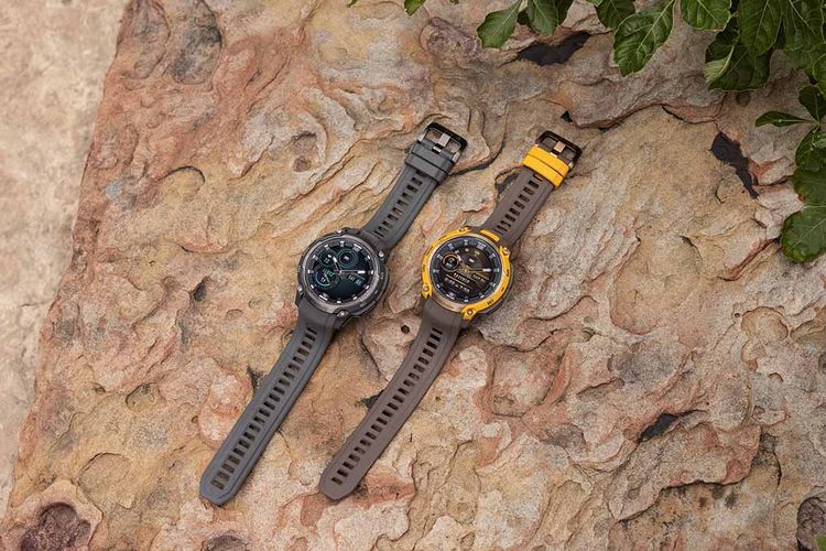 Ilustrasi garmin instinct crossover amoled warna charcoal (kiri) dan bronze/sunburst.