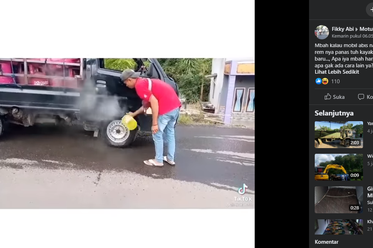 Tangkapan layar video pengemudi mobil pikap menyiram rem mobilnya yang panas dengan air.