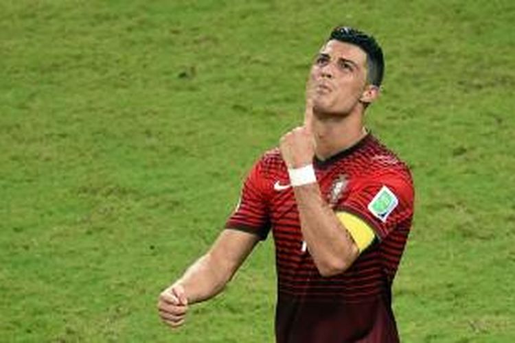 Salah satu ekspresi gelandang Portugal, Cristiano Ronaldo, pada pertandingan kedua Grup G Piala Dunia melawan Amerika Serikat, di Arena Amazonia, Manaus, Minggu (22/6/2014).