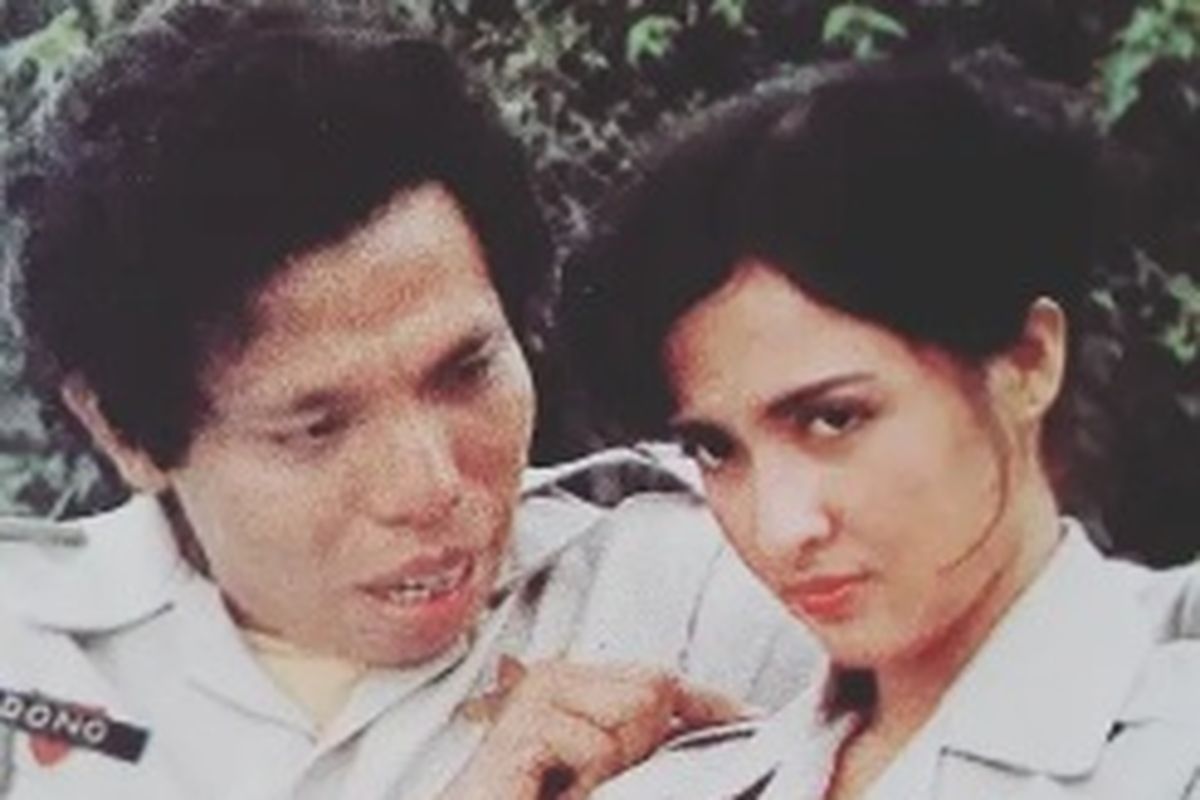 Aktris Sherly Malinton bersama Dono di salah satu film Warkop DKI.