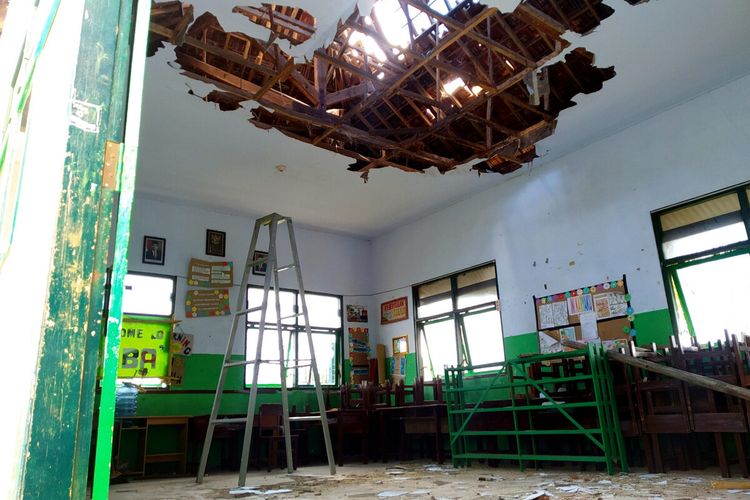 A Classrooms' roofs and ceilings collapsed following an earthquake in Malang, East Java on Saturday, April 10.
