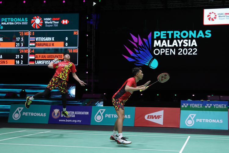Fajar Alfian dan Muhammad Rian Ardianto saat tampil di Malaysia Open 2022 pada Kamis (30/6/2022).