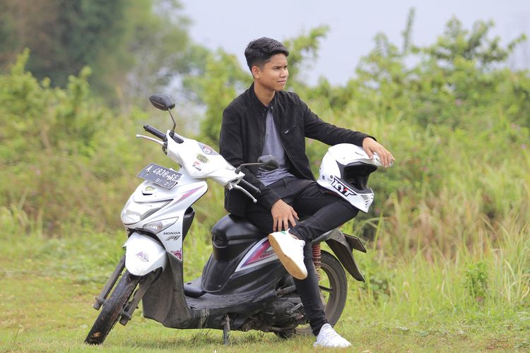 Delvintor Alfarizi menggunakan Honda Beat