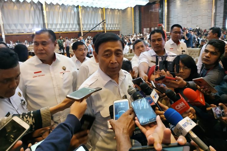 Menteri Koordinator Bidang Politik, Hukum, dan Keamanan (Menko Polhukam) Wiranto saat menghadiri Rapat Koordinasi Nasional (Rakornas) penyelenggaraan Pemilu 2019 di Hotel Grand Paragon, Jakarta, Rabu (27/3/2019).   