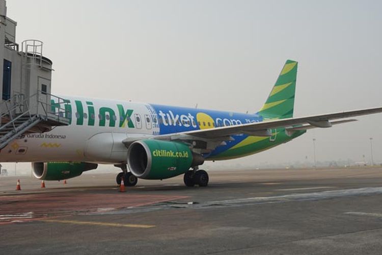 Pesawat Citilink dengan logo tiket.com di Bandara Soekarno-Hatta, Jumat (27/7/2018).  