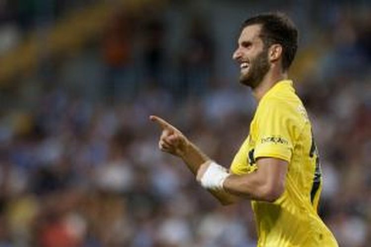 Pemain pinjaman Atletico Madrid, Leo Baptistao, mengantarkan kemenangan Villarreal atas timnya, Sabtu (26/9/2015). 