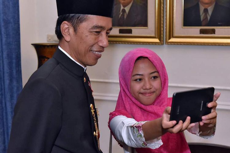 Asa Firda Inayah alias Afi saat bertemu dengan Presiden Joko Widodo di Gedung Pancasila, Kompleks Kementerian Luar Negeri, Jakarta Pusat, Kamis (1/6/2017).