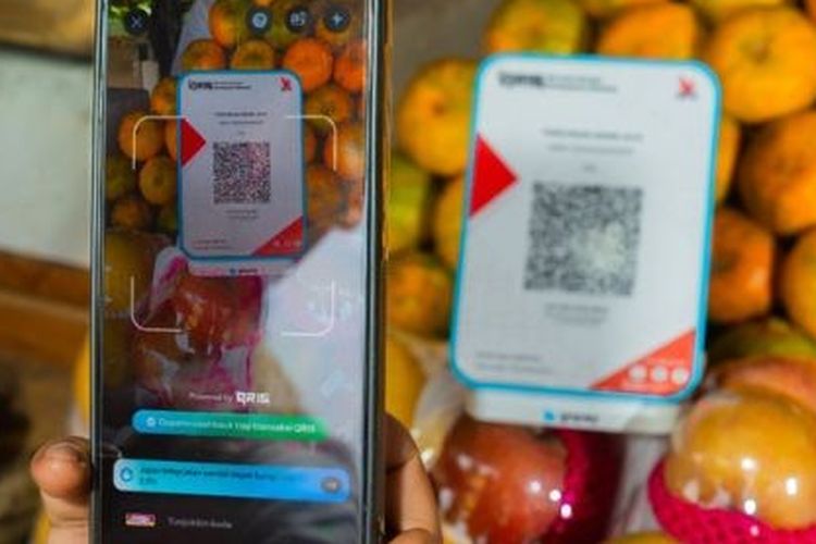 Ilustrasi pembayaran menggunakan QRIS. 