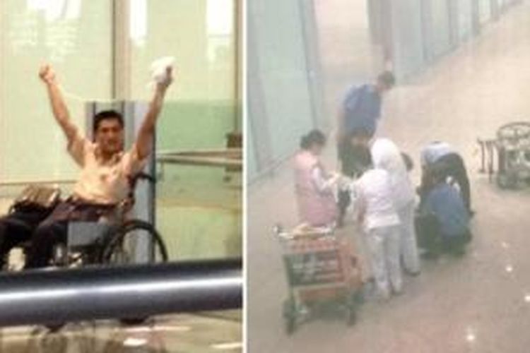 Seorang pria (kiri) tampak duduk di atas kursi roda dan mengangkat sebuah benda yang diduga bom rakitan di Terminal 3 Bandara Internasional Beijing, China, Sabtu (20/7/2013). Petugas medis tengah dan polisi memeriksa pria tersebut beberapa saat setelah terjadi ledakan.