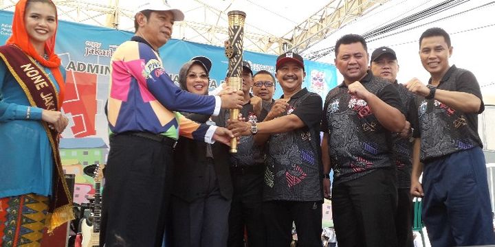 Kampung Tomang RW 02, Grogol Petamburan sukses menjadi tuan rumah kirab obor Asian Para Games 2018 di Jakarta Barat setelah memenangkan Kampung Branding pada Selasa (2/10/2018).