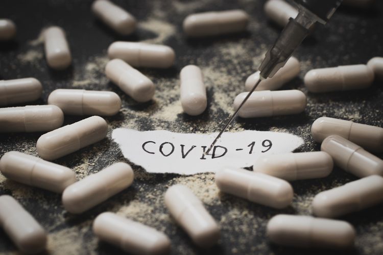 An illustration of Covid-19 pills. 