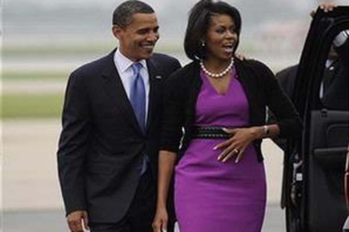 Michelle Obama dan suaminya Barack Obama.