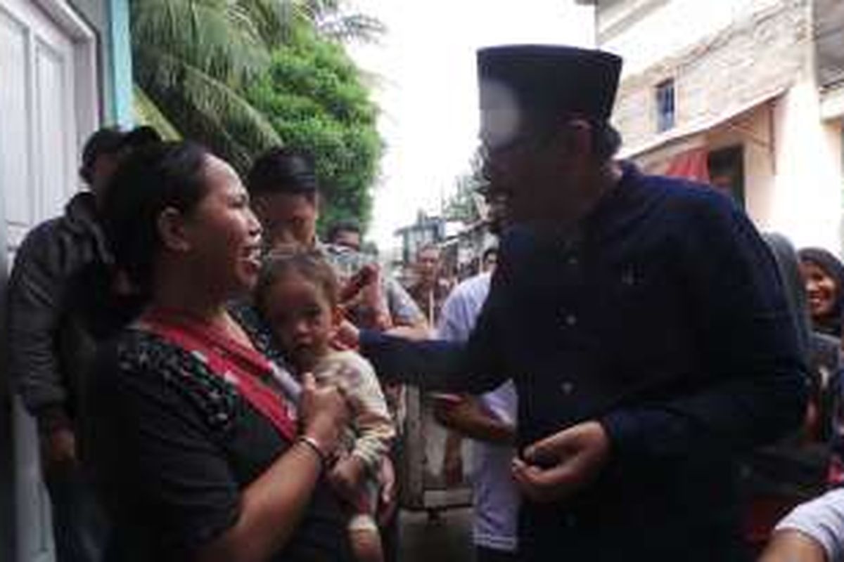 Calon wakil gubernur DKI Jakarta Djarot Saiful Hidayat saat berkampanye di Jalan Teluk Beting Jaya, Koja, Jakarta Utara, Jumat (9/12/2016).