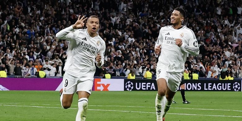 Pemain depan Real Madrid, Kylian Mbappe, merayakan gol ketiganya bersama Jude Bellingham pada laga play-off fase gugur Liga Champions UEFA antara Real Madrid CF dan Manchester City di stadion Santiago Bernabeu di Madrid pada 19 Februari 2025. (Foto oleh OSCAR DEL POZO / AFP)