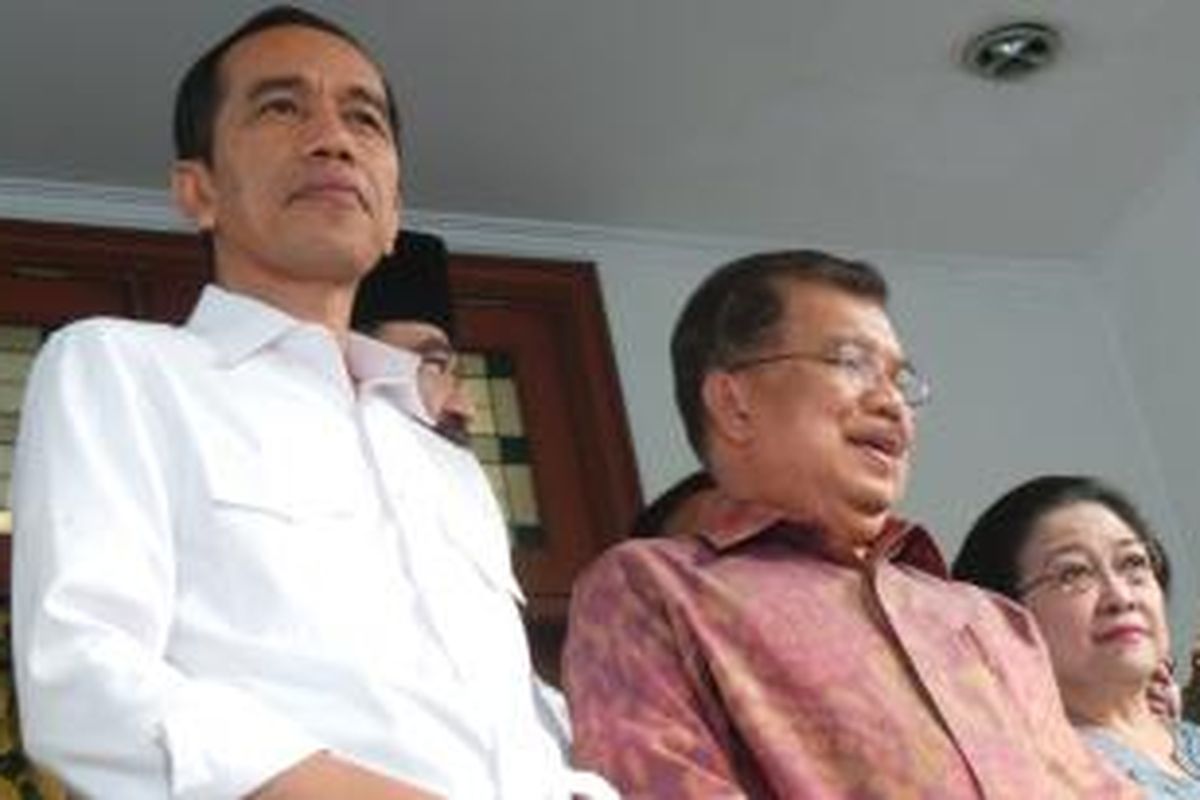 Presiden terpilih, Joko Widodo bersama wakil presiden terpilih, Jusuf Kalla dan Ketua Umum PDI-P, Megawati Soekarno Putri.